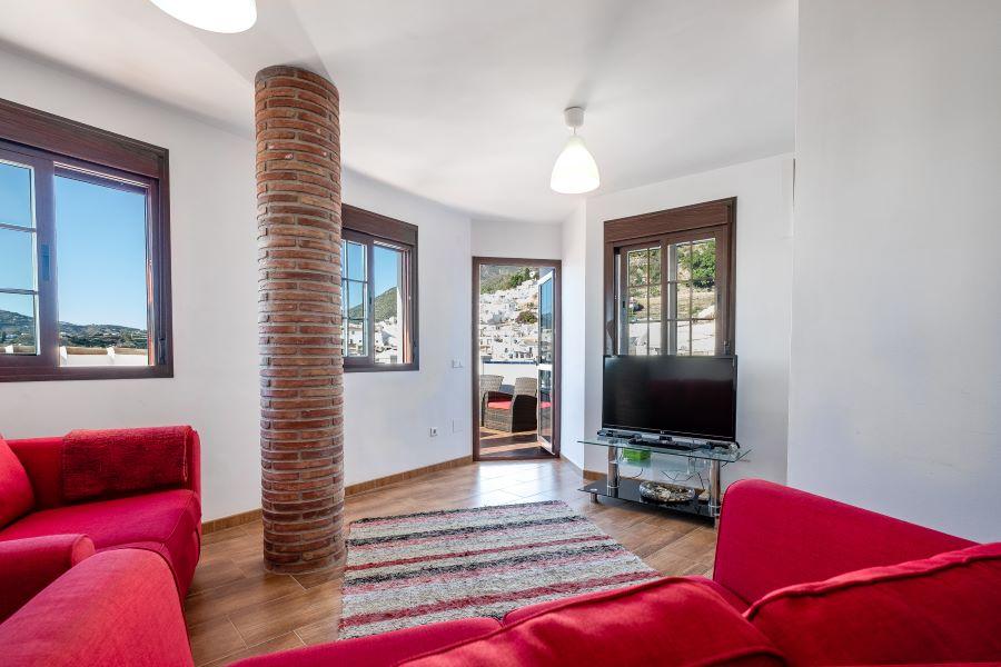 Appartement in Frigiliana met uitzicht op de bergen.