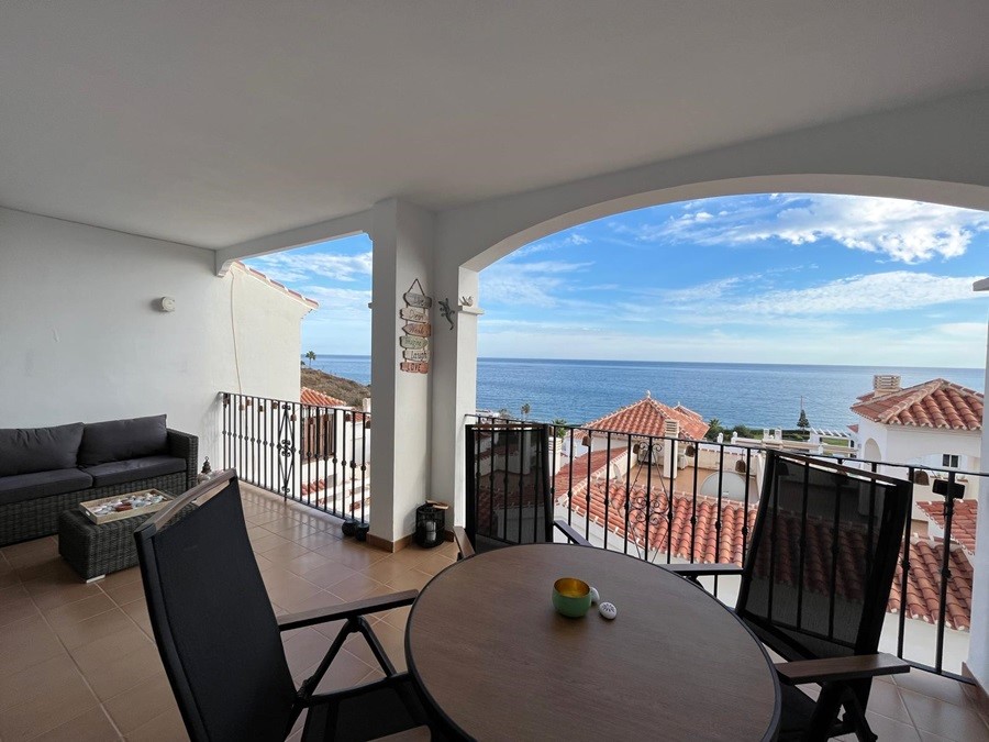 Two apartments located below each other with beautiful sea views, communal pool and garage space in El Peñoncillo, Torrox